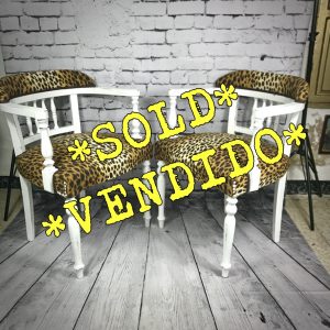 2 Leopard Print Carver Chairs