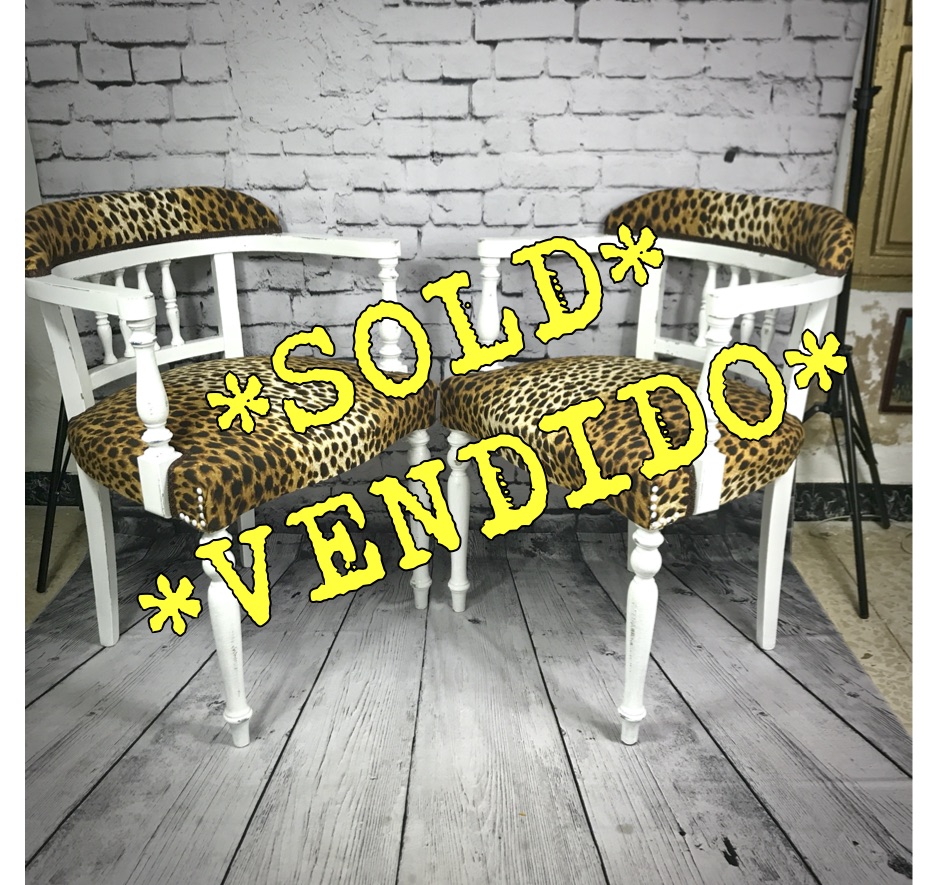 2 Leopard Print Carver Chairs