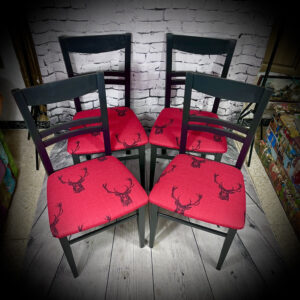 4 Dining Chairs in black and 'stag' fabric
