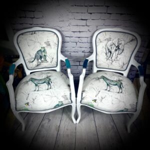 2 white animal chairs