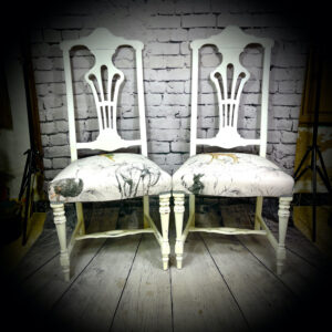 2 white elephant chairs